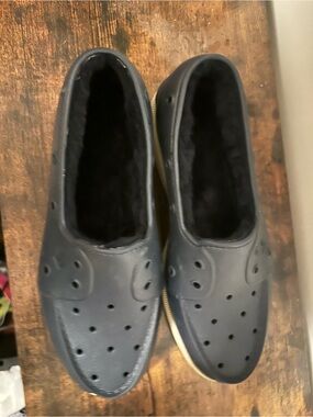 Sperry Men's Slip-On Loafers in Navy with Perforated Upper Fuzzy/ Warm interior.